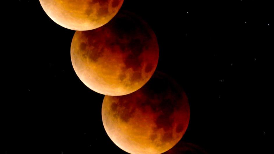 Stunning photos of the 'super blue blood moon' from Tucson, around the world